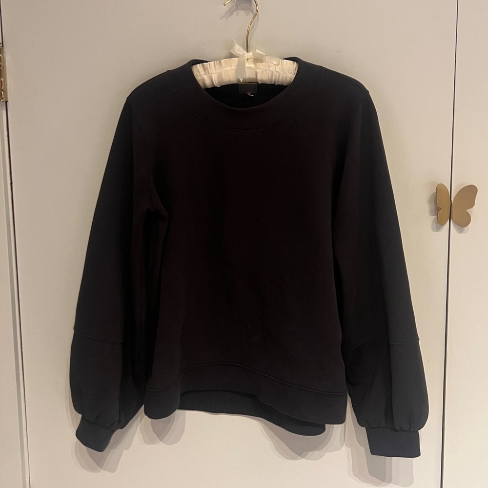 CALIA black sweatshirt with subtle bell sleeves